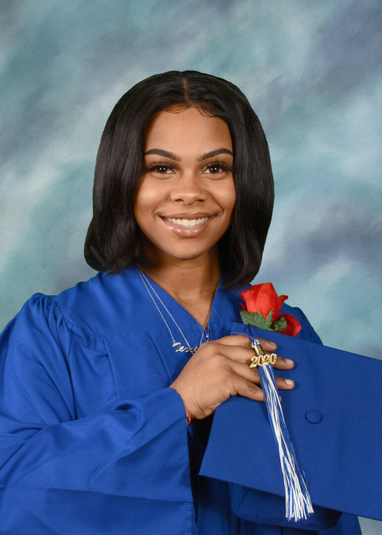 A Girl in a Blue Color Robe Holding a Rose